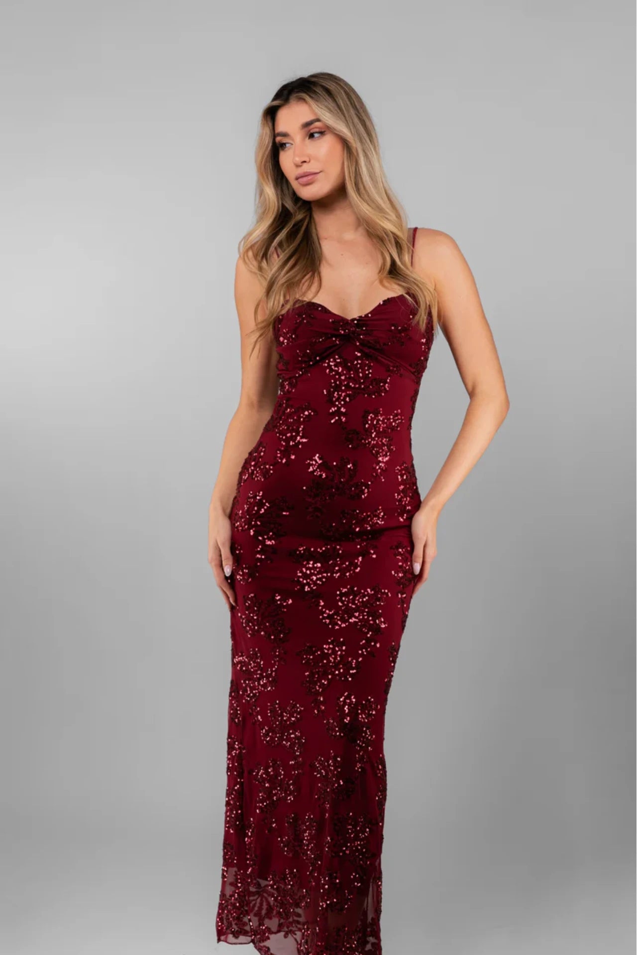 Sophisticated Black Maxi Dress with a Sheen and a Sweetheart Neckline